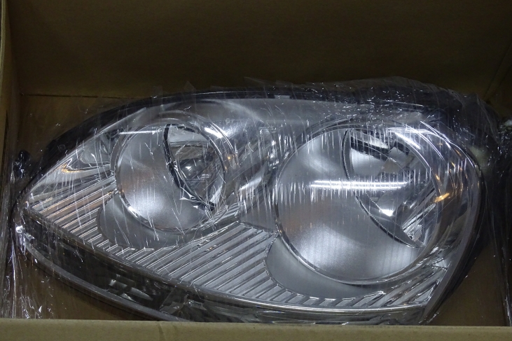 Koplamp Golf 5 links